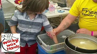 Dipping hands in WAX , Kids keepsake idea Northern Ireland