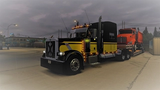 American Truck Simulator Cat Power C-16 moving a disabled KW T660 dump Truck.