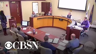 White official tells black woman he belongs to "master race"