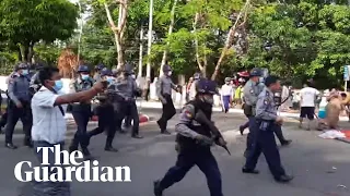 Myanmar police filmed confronting protesters and firing rubber bullets at crowds