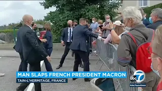 French President Macron slapped in face by member of public | ABC7