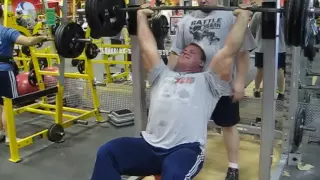 Derek Poundstone 315 lb seated shoulder press for reps