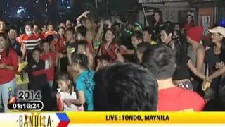 Tondo residents welcome 2014 in costumes