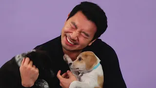 Simu Liu Plays With Puppies While Answering Fan Questions