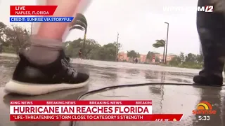 VIDEO NOW: Cameraman Drops Camera to Run to Help People Fleeing Hurricane Ian