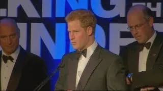 Prince Harry supports injured soldiers at Walking With The Wounded charity dinner