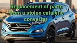 Hyundai Tucson stolen catalytic converter replacement.  O2 sensor replacement