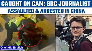 BBC journalist covering Covid protests assaulted and detained in China | Watch | Oneindia News*News