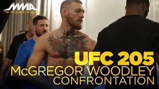 Conor McGregor, Tyron Woodley Share Moment at UFC 205 Weigh-Ins