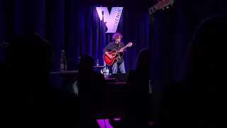 Dan Navarro at The Venue, Aurora, IL, singing about the weather and whatever comes to mind
