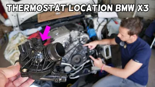 WHERE IS THE THERMOSTAT ON BMW X3 E83