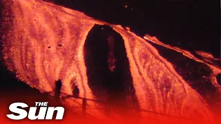 La Palma volcano bursts with rivers of lava