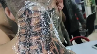 zombie boy inspire tattoo with neck.