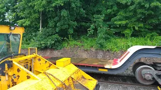 Gennesee and Wyoming New England Central 608 passes through the rain in Mansfield Depot Connecticut