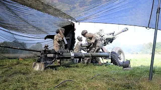 Paratroopers Fire M119 Howitzer