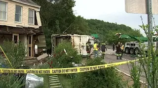 Garbage Truck destroys home; comes close to hurting child