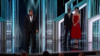 Julianna Margulies presents the DeMille Award to George Clooney