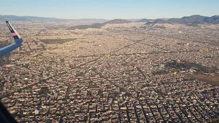 TAKEOFF FROM MEXICO CITY AIRPORT.  AND FLYING OVER THE CITY ..beautiful weather