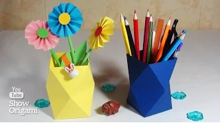 Origami vase made of paper or pencil holder.