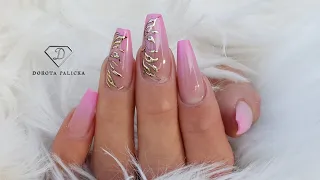 Sculpted coffin shape gel nails with pink babybomer and gold transfer foil nail art.