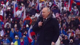 Putin cheered by tens of thousands at Moscow rally after meeting Chinese diplomat