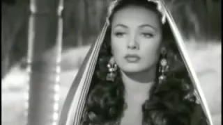 Talk about entrances! Merely Enchanting! - Gene Tierney