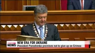 Ukraine's new president promises not to give up on Crimea