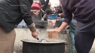 Food kitchen provides essential meals to hundreds of Palestinians sheltering in Rafah