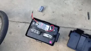 Battery, box, circuit breaker, quick disconnector for trolling motor.