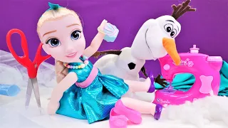 Frozen Karlar Ülkesi. Olaf Elsa için dikişsiz şık elbise yapıyor. Eğitici oyun.