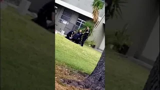 Miami police officer kicks handcuffed man in head