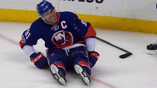 Tavares helped off ice after getting caught up in net