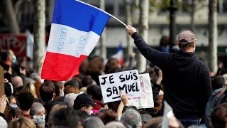France rallies in solidarity and defiance after beheading of teacher near Paris