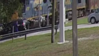 Woman barely escapes train impact in Miami-Dade