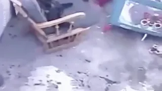 Cat blocks and prevents a baby from crawling to a fatal fall down some stairs