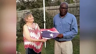 Confederate flag tears a neighborhood apart before it comes together