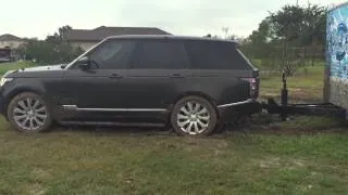 Range Rover Havannah pulls my trailer  out of mud