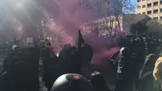 Anti-government demonstrators march to California State Capitol on Inauguration Day