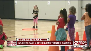 Students take shelter during tornado warning