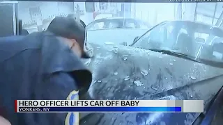 Officer lifts car