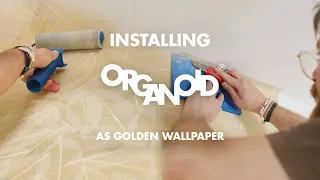 Installation of Organoid® Natural Surfaces as golden wallpaper