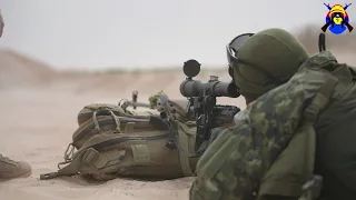 "Unifying Forces: Polish and Guinea Soldiers Training Side by Side"