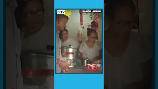 West Bengal CM Mamata Banerjee makes tea & serves it to people at a tea stall