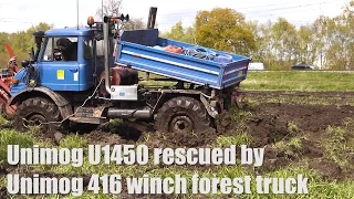 Unimog 416 recovers Unimog U1450 out of the mud