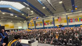 GCC graduation ends with falling balloons on the graduates.