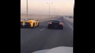 LaFerrari vs Lamborghini Sesto Elemento face off on desert highway in Qatar