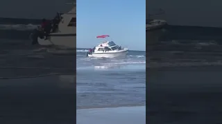 Dozens of people poured off a beached boat in Mission Beach, San Diego. #news