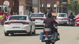 Elwood shows up for fallen officer, lining procession route to say goodbye