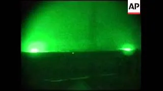 Nightscope vision of fighting and day shots of explosion