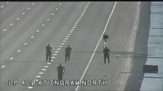 Man walks along busy San Antonio highway, briefly shutting down traffic